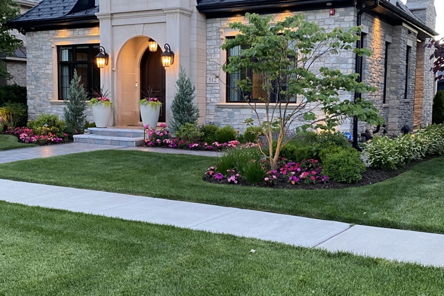 Stone paver walkway and landscaping installation 