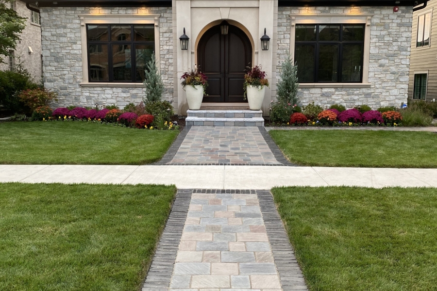 Stone paver walkway landscaping installation 